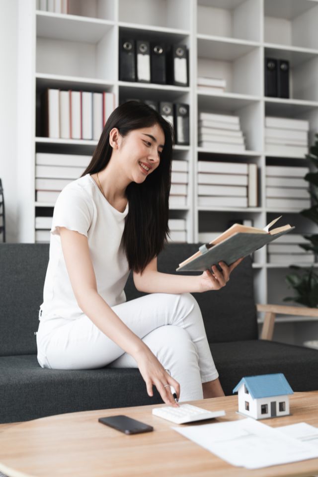 Professional financial advisor working on couch